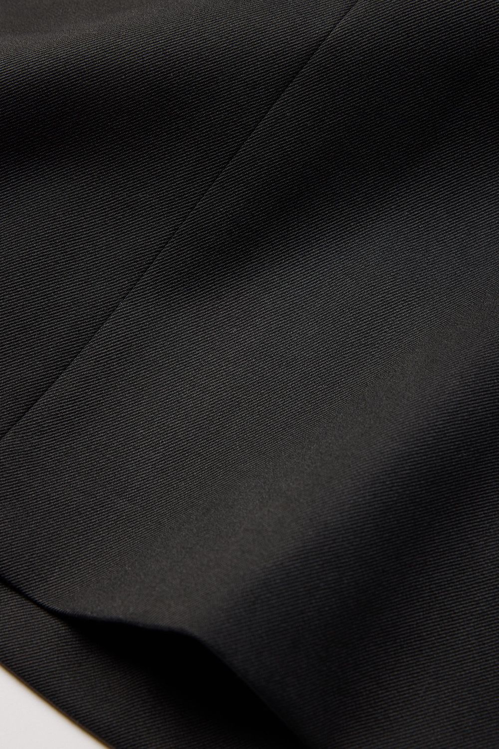 Soft merino twill lining at waistline and slippery cupro-lined body