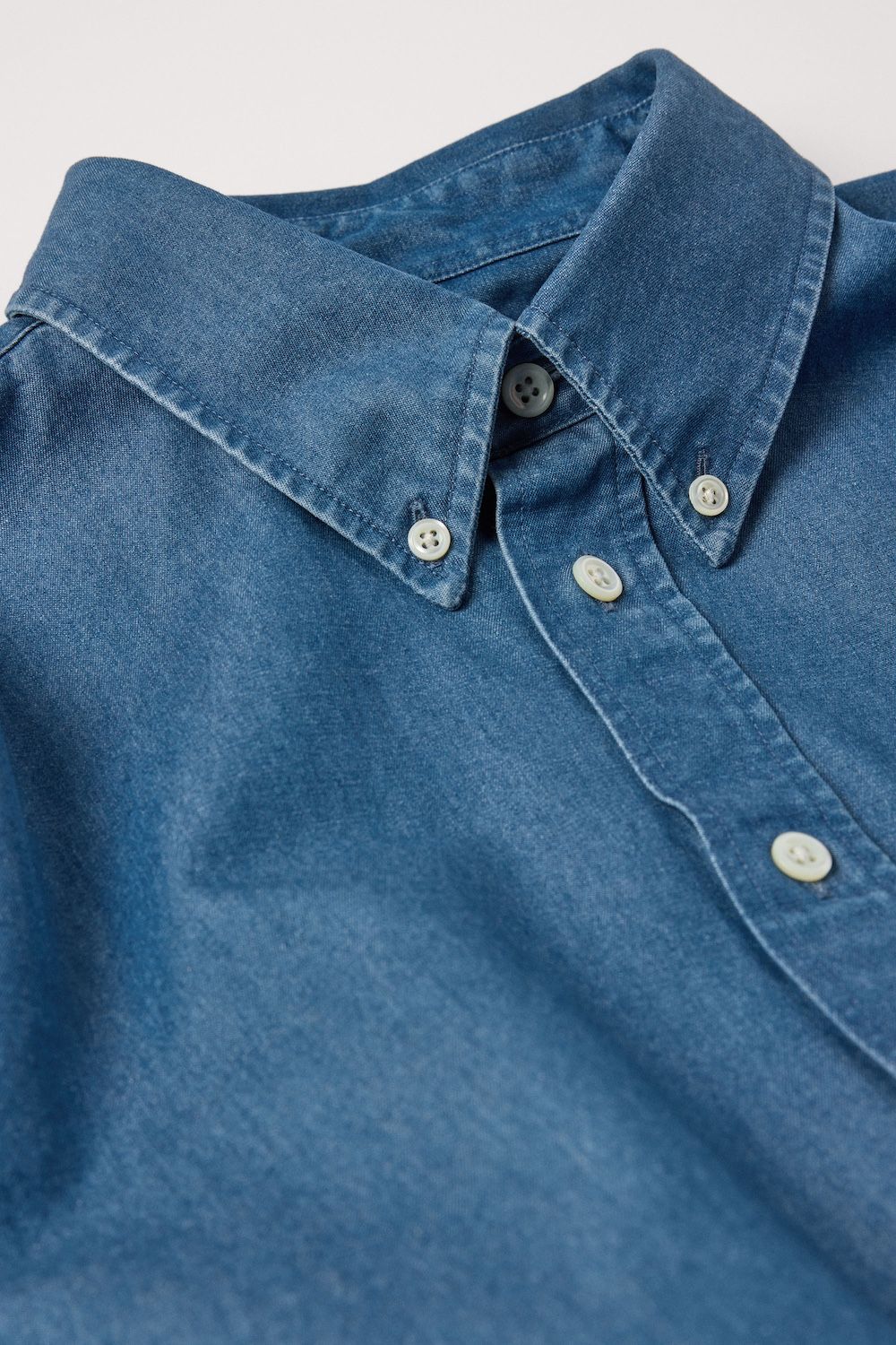 Button down collar and gently rounded cuffs
