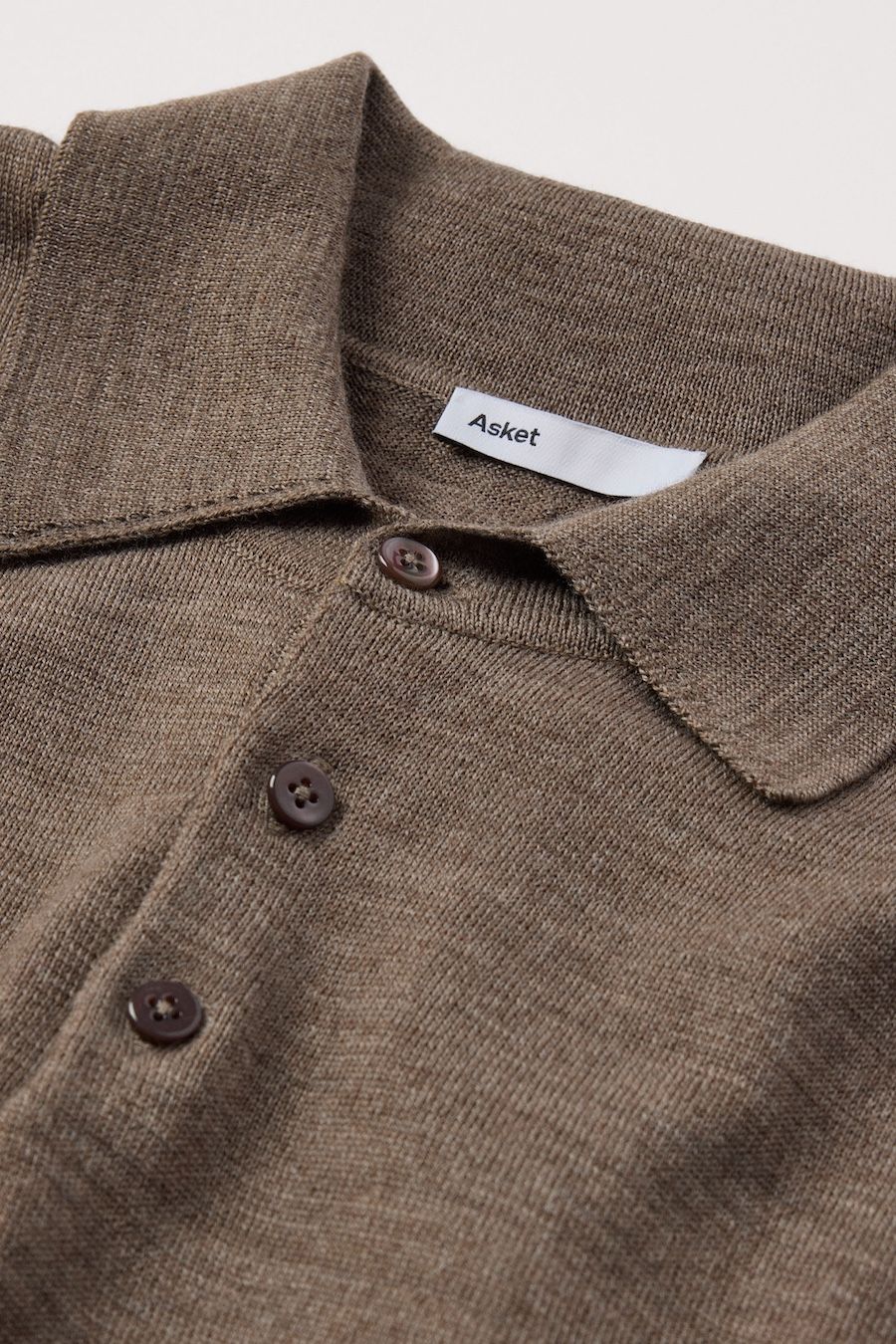 3-button placket with tonal Mother of Pearl buttons