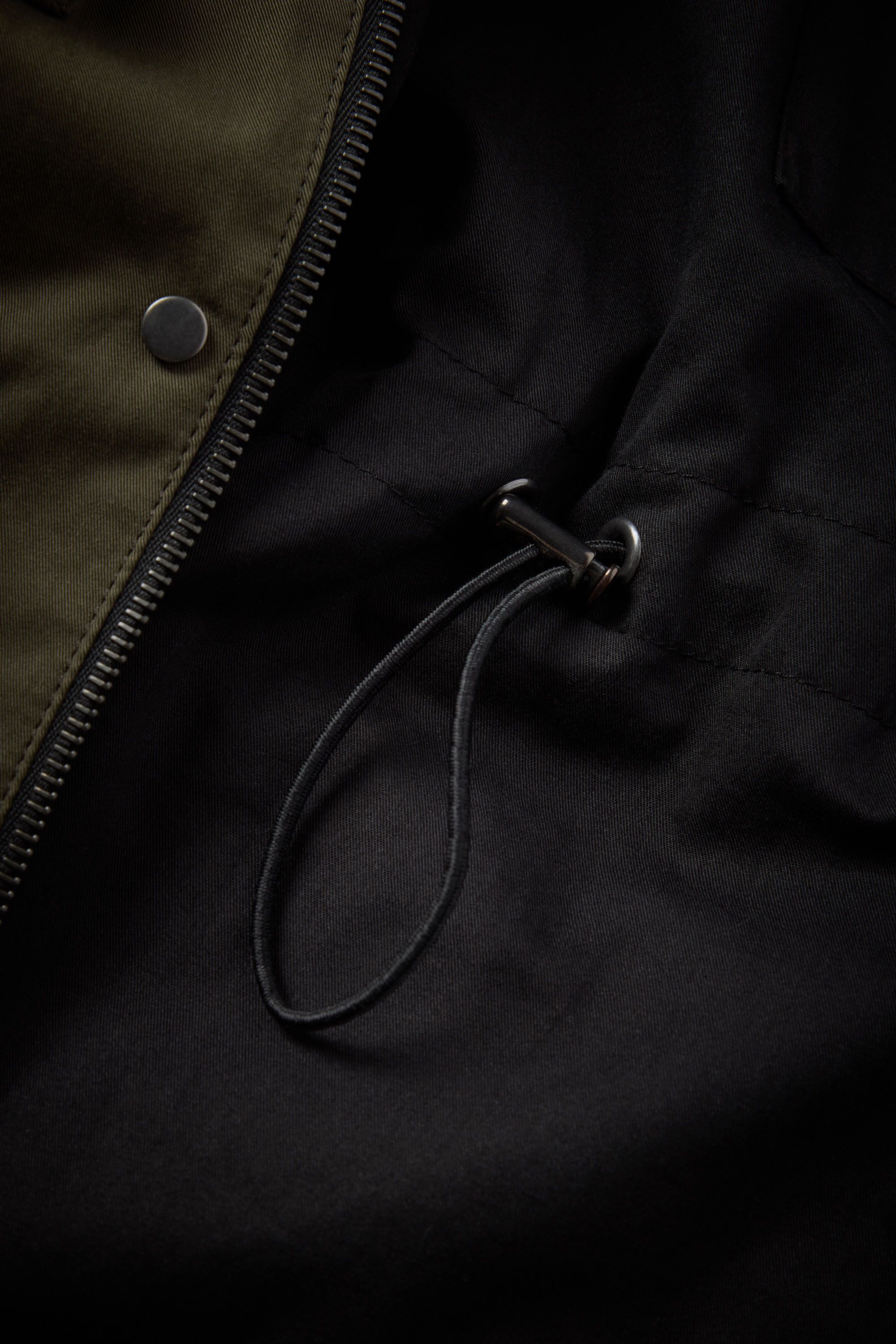 Fully lined interior with inside patch pocket & drawstring channel waist