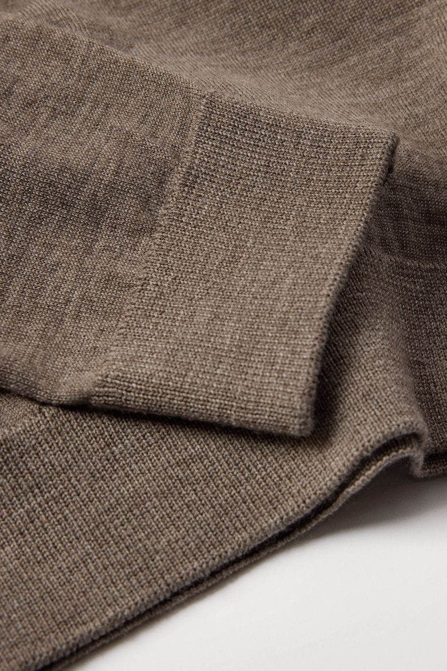 Neat 1x1 rib on hem and cuffs