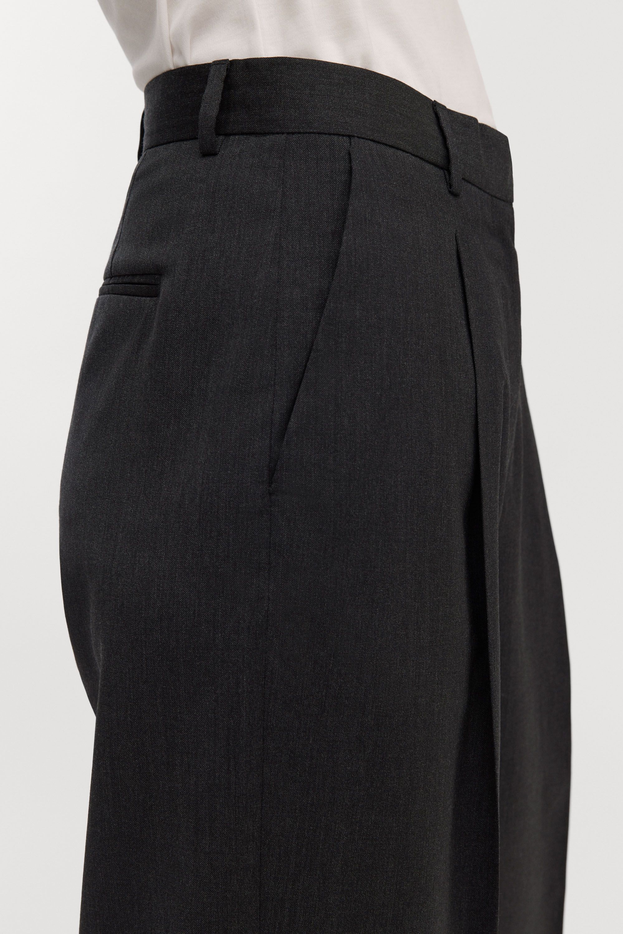 Slanted side pockets and welted back pockets