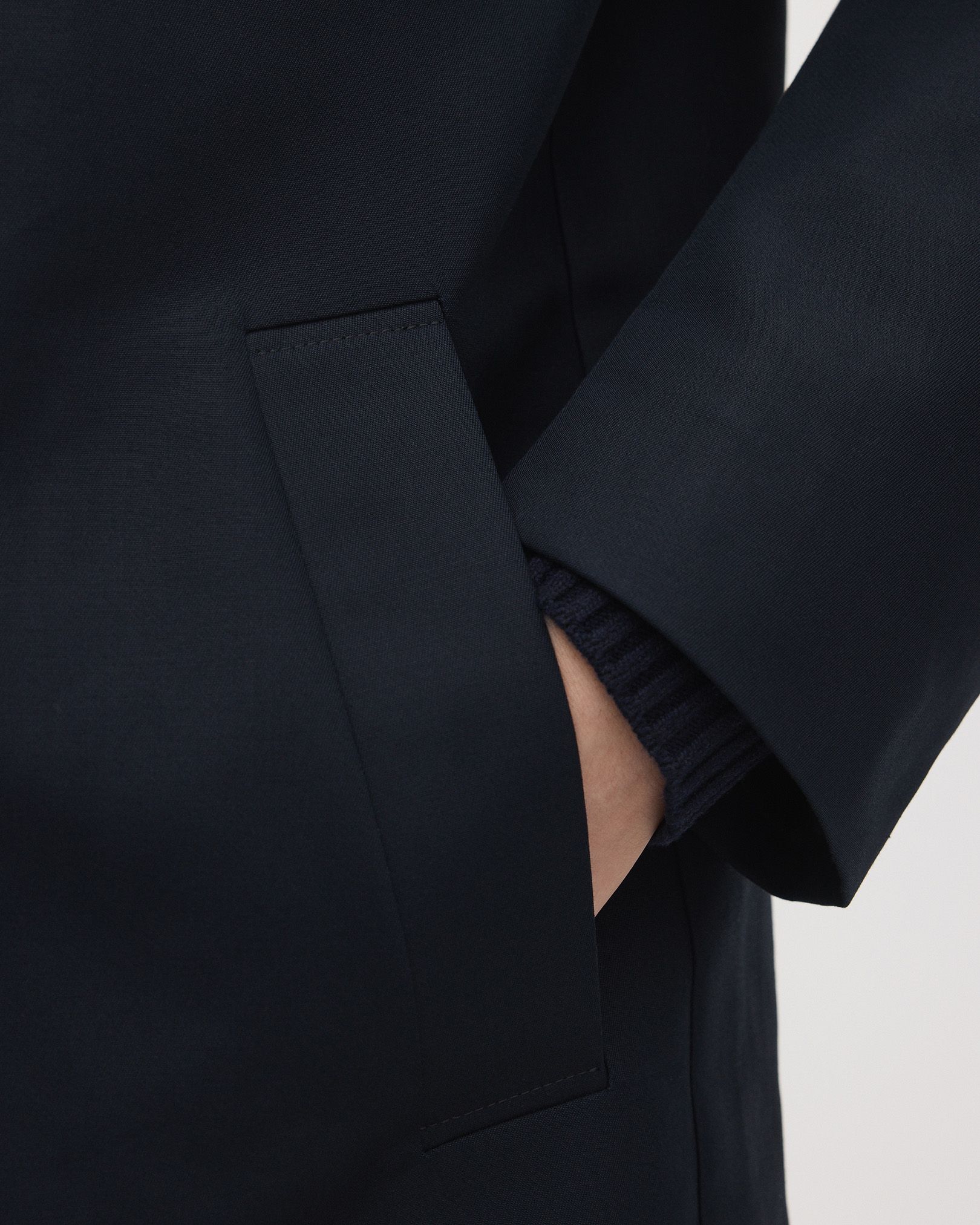 Four front pockets with snap buttons
