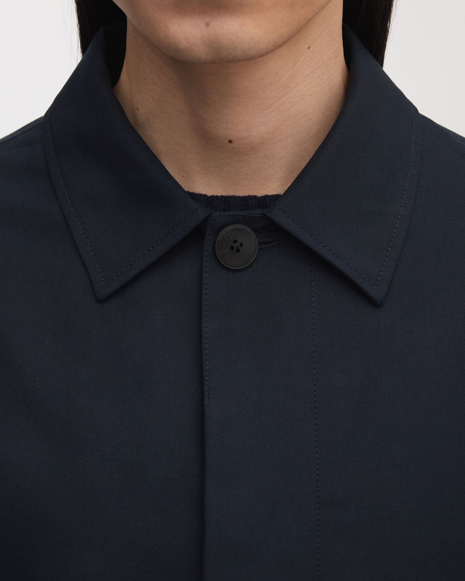 Hidden front placket with Corozo buttons