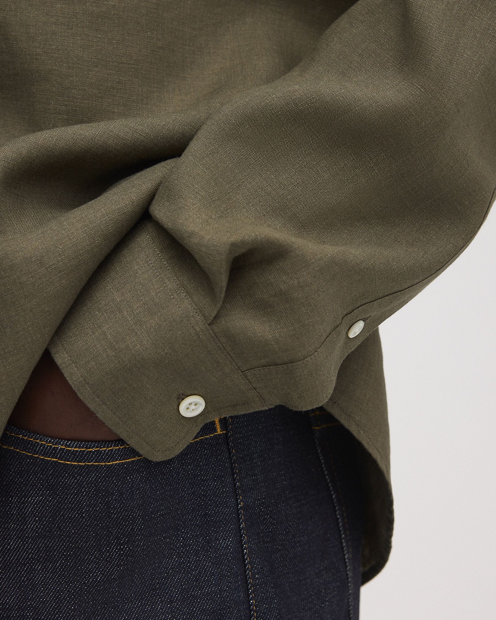 Rounded, single button cuffs