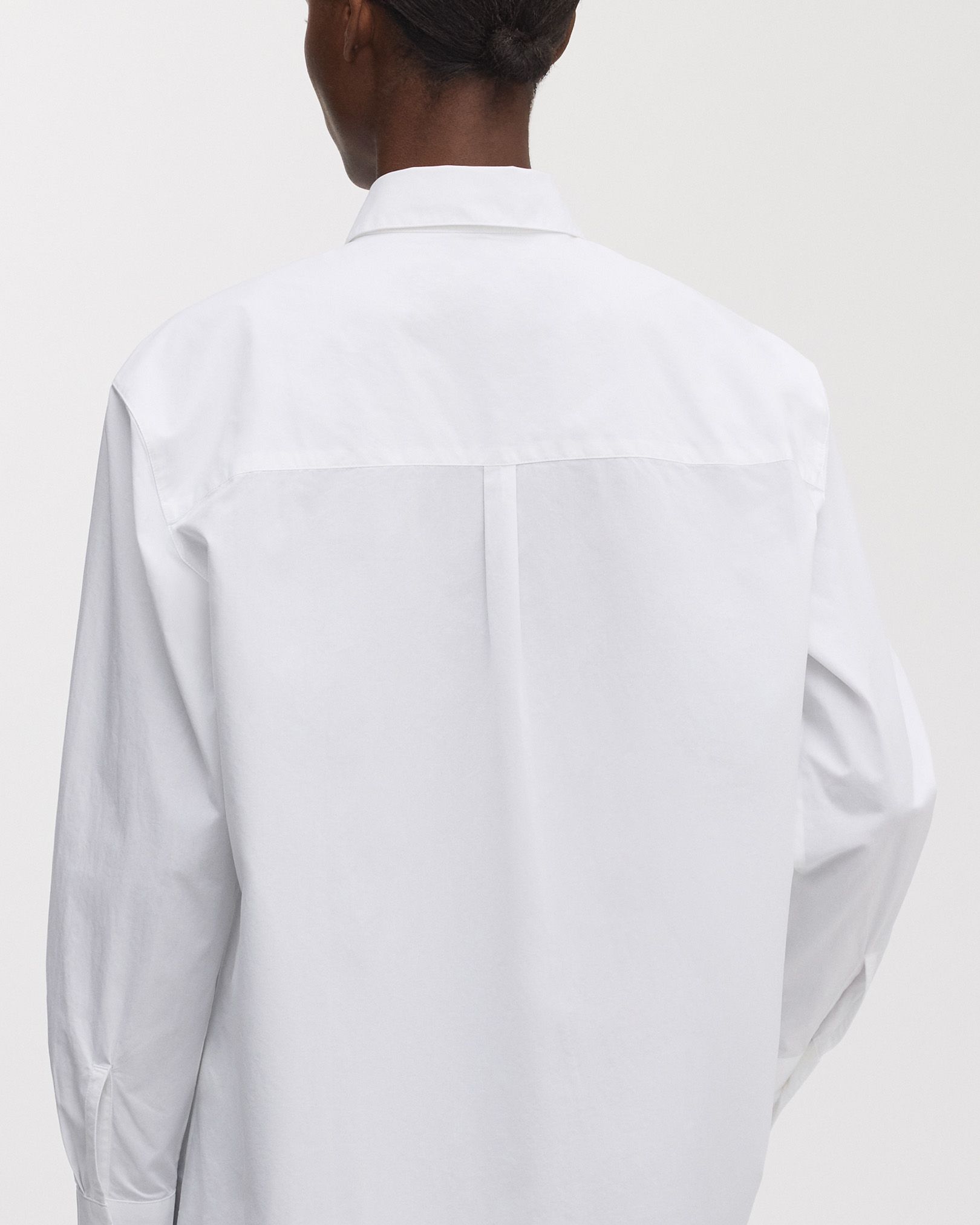 Inverted box pleat at back for freedom of movement