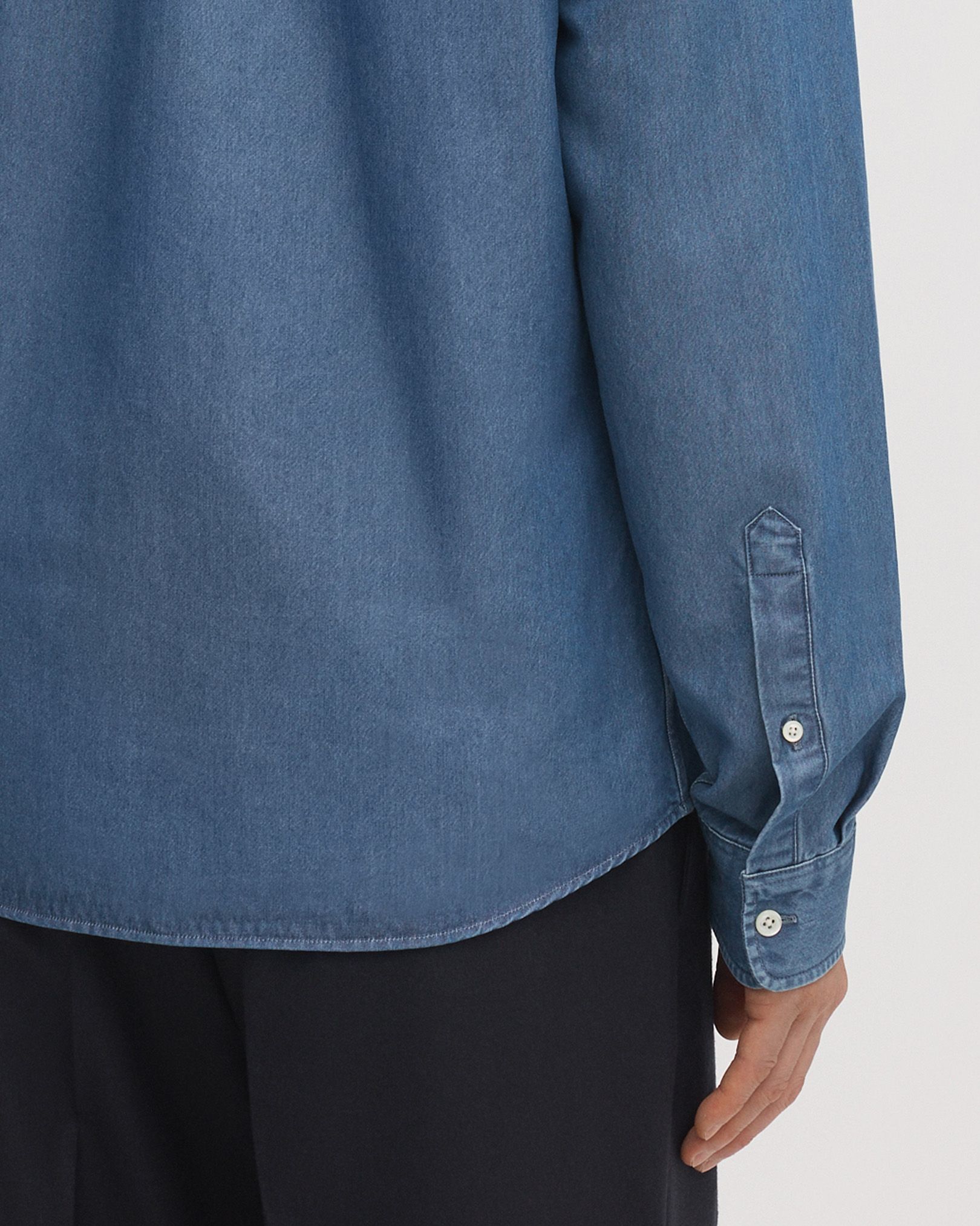 Rounded, single button cuffs