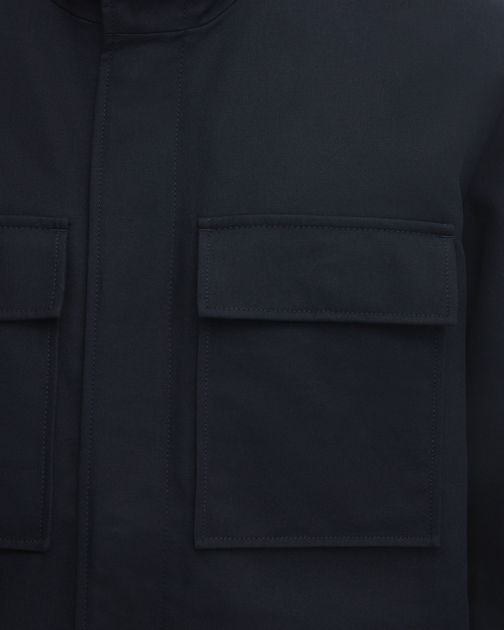 Four front pockets with snap buttons