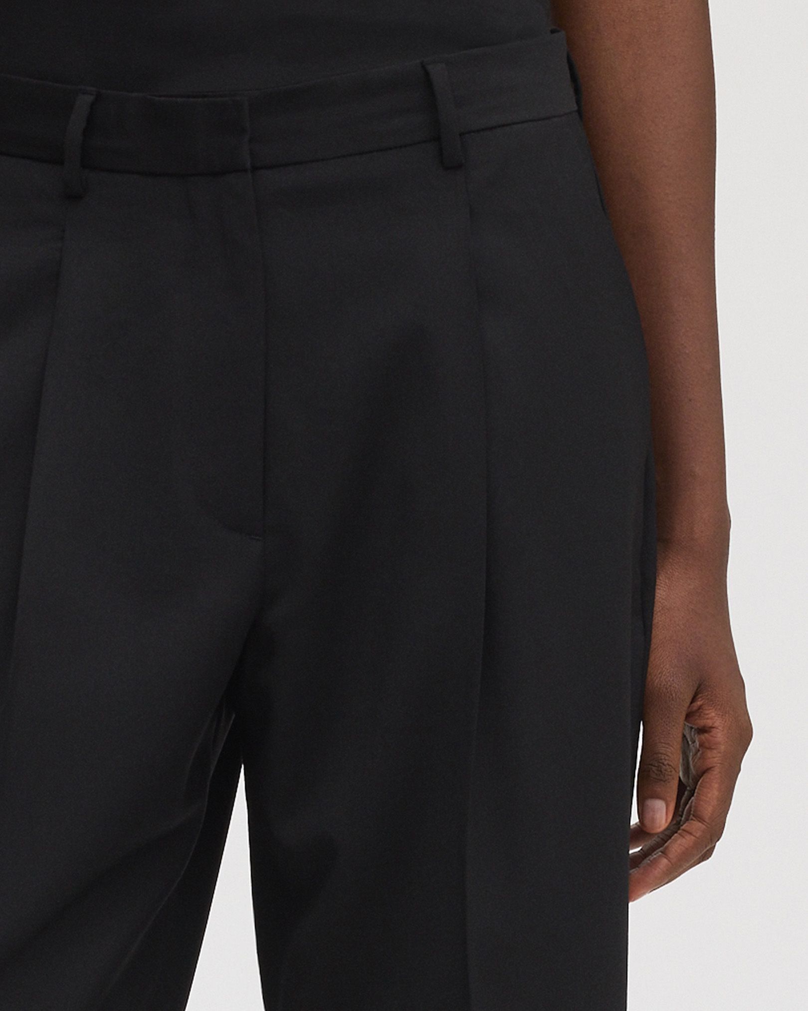 Tailored waistband with hidden hook and button