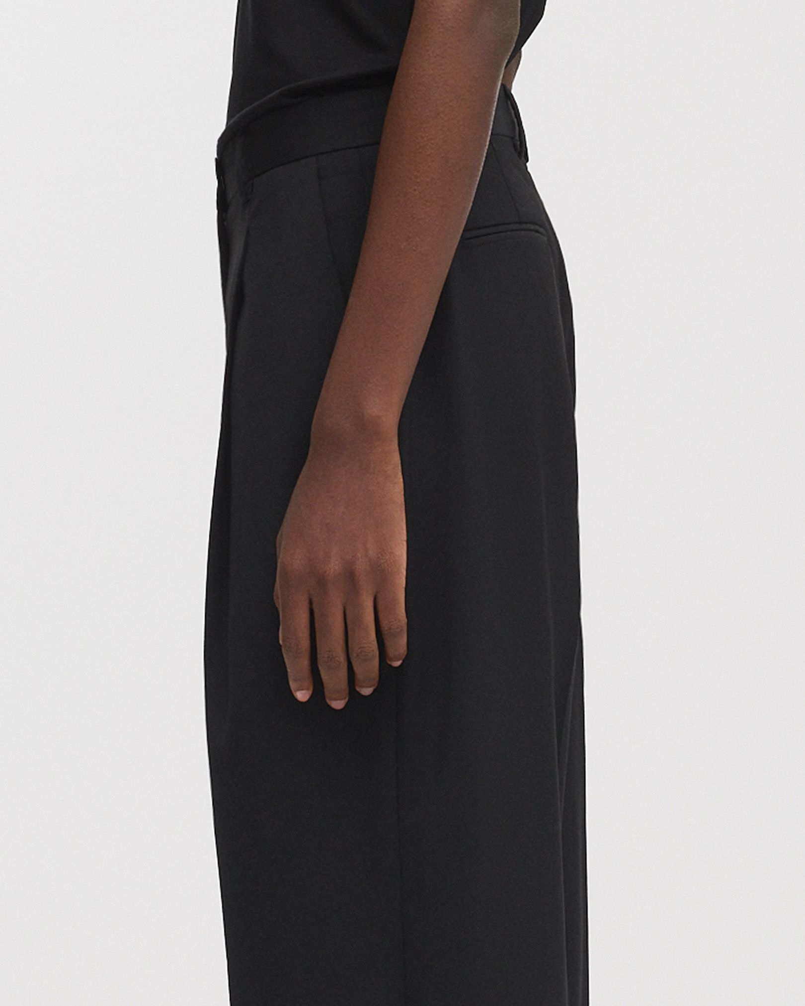 Slanted side pockets and welted back pockets