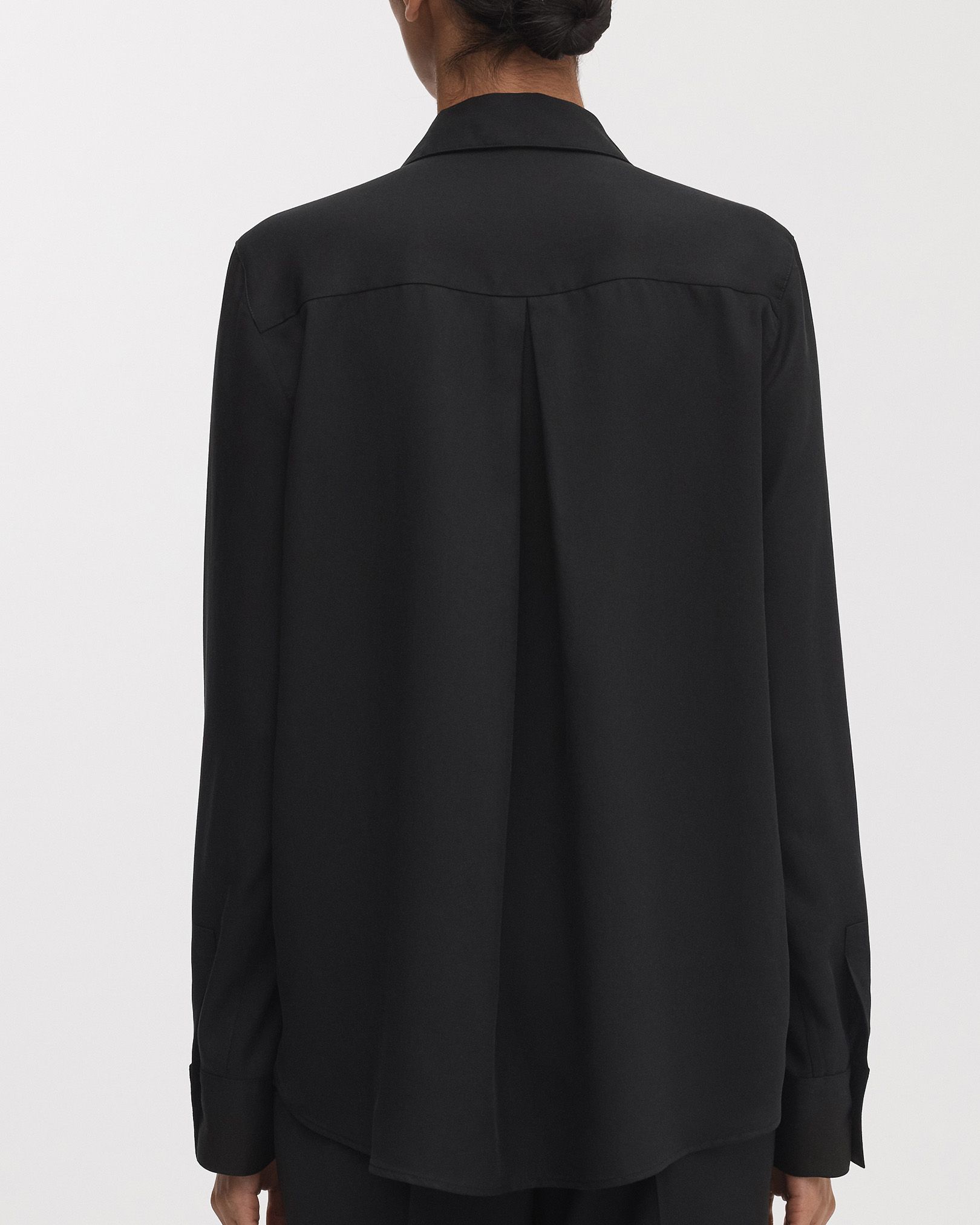 Inverted box pleat at back for freedom of movement