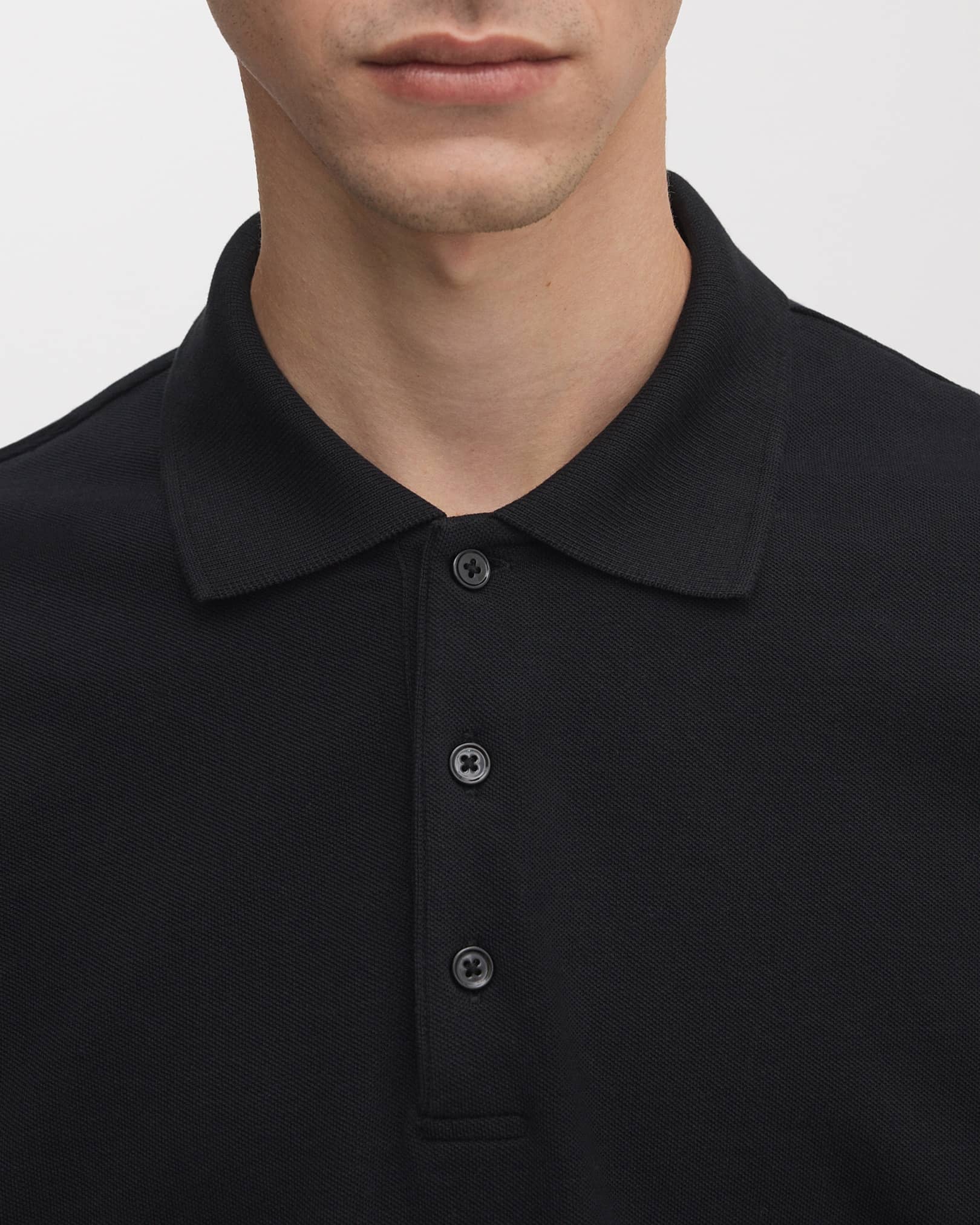 French three-button placket with tonal Mother of Pearl buttons