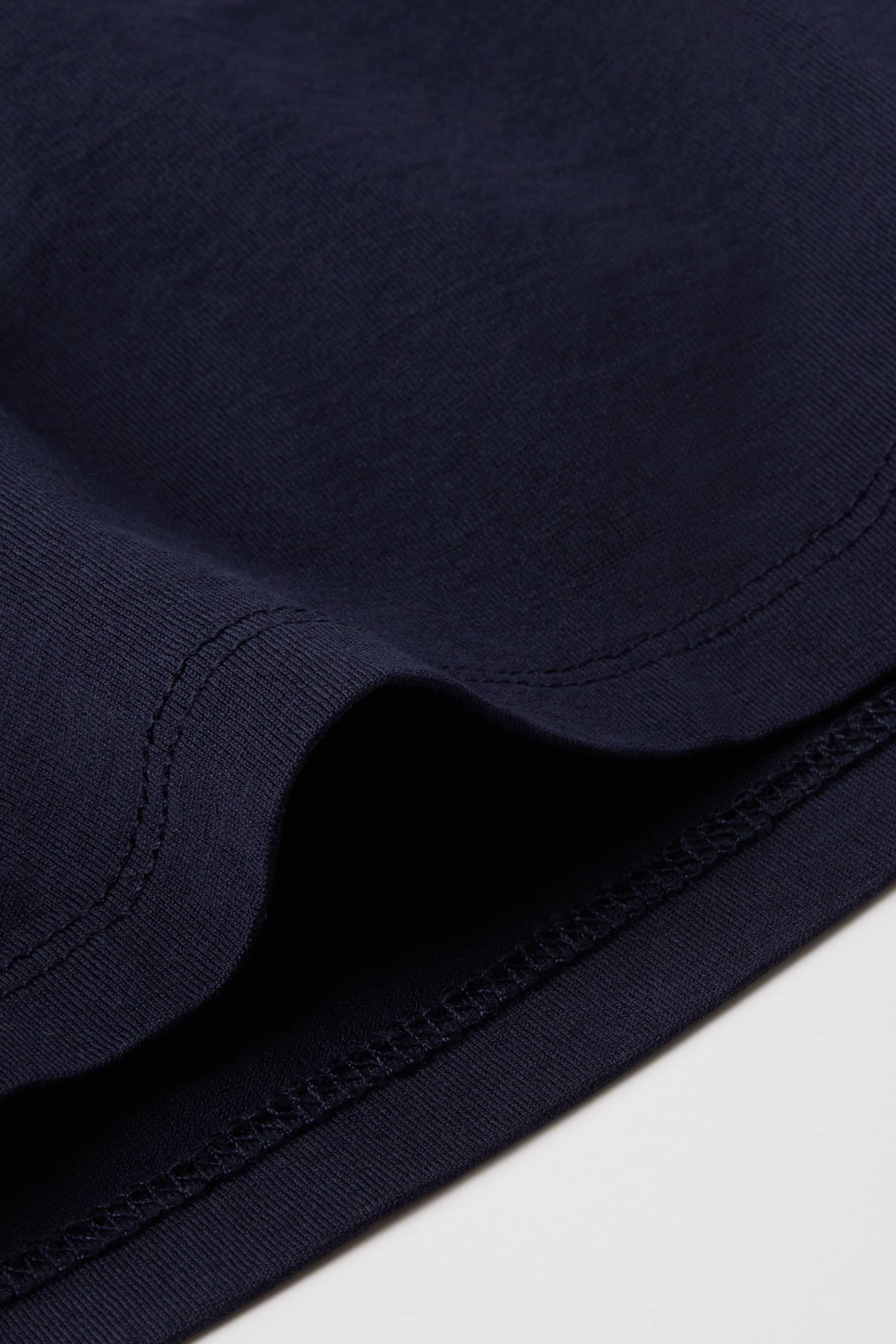 Twin needle stitched hems
