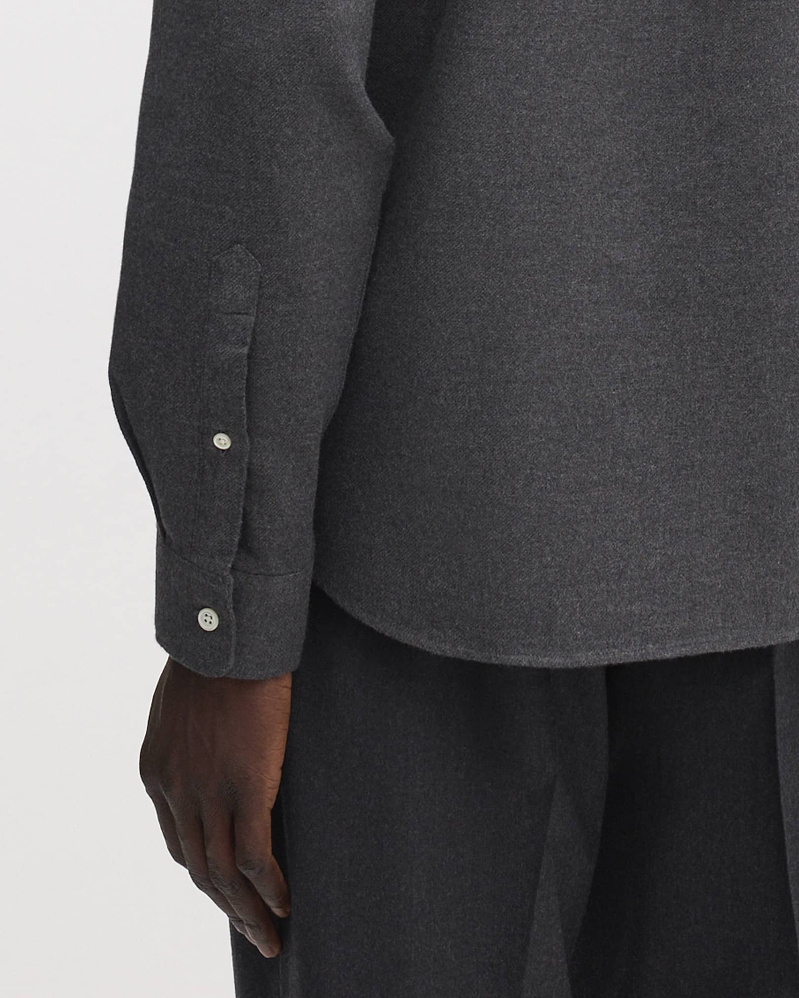 Rounded, single button cuffs