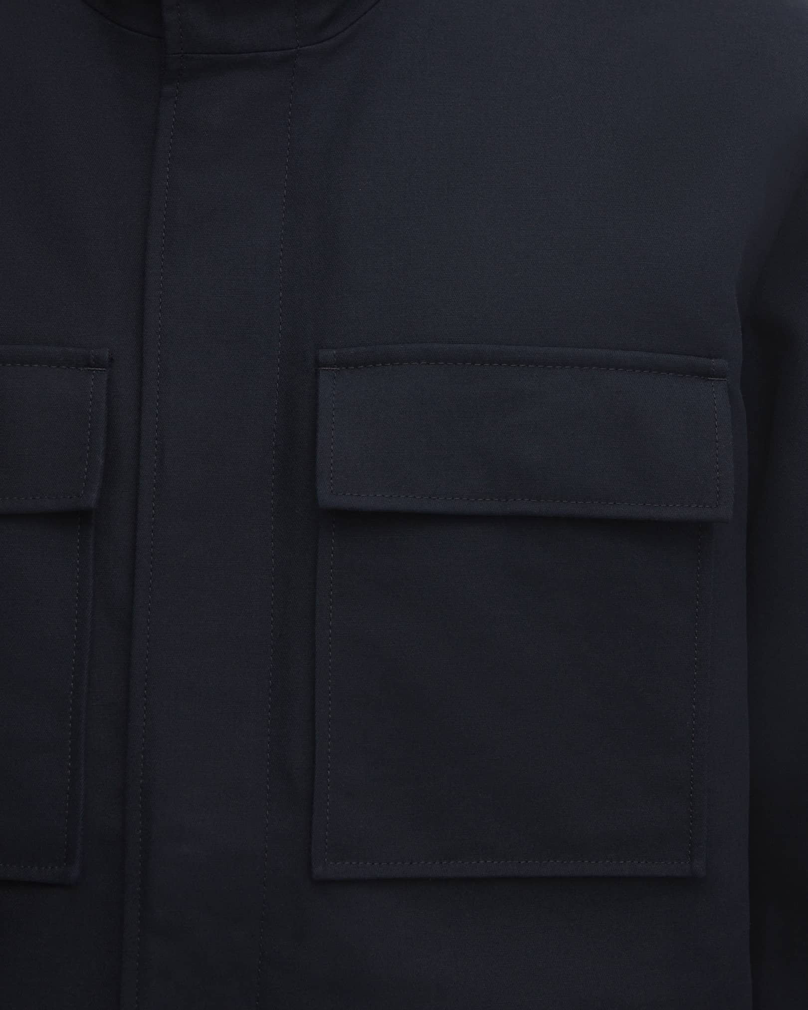 Hidden front placket with one-way zip and snap buttons