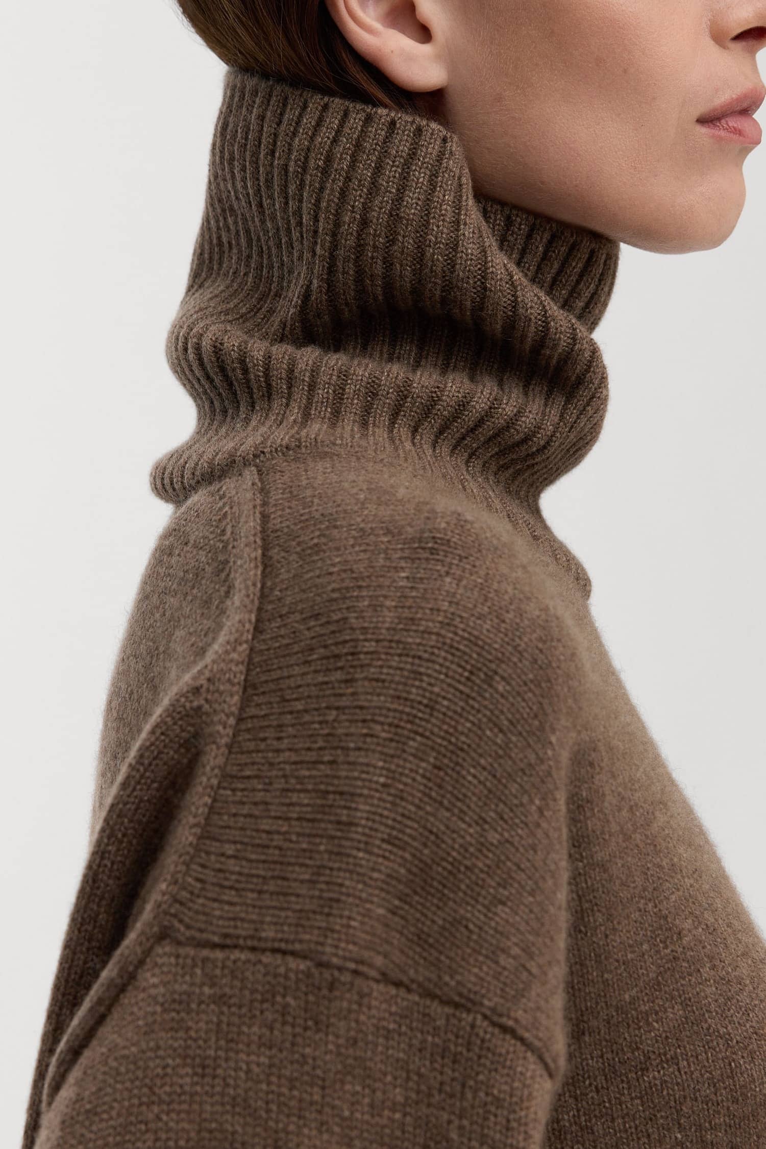 A generous roll-neck that can be worn folded or tall, for warmth and protection