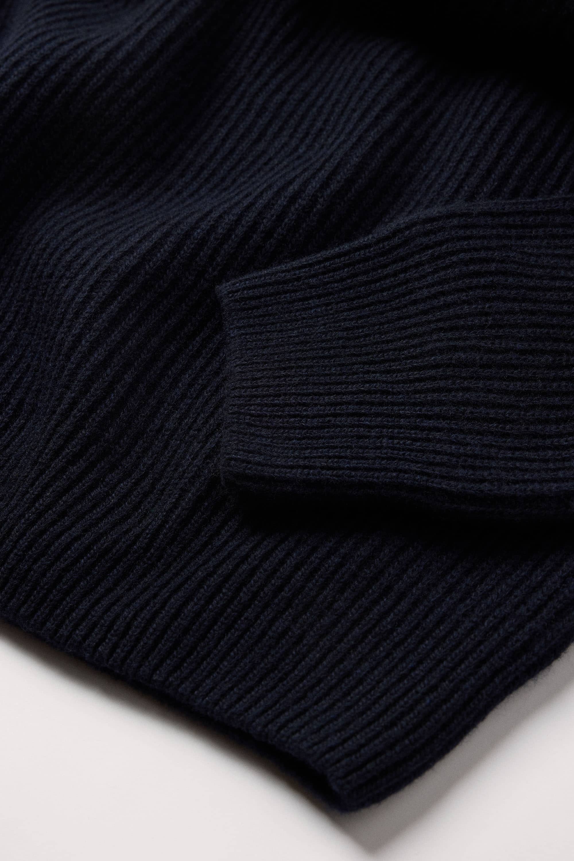 1x1 ribbed "grown on" cuffs and hems for a clean transition