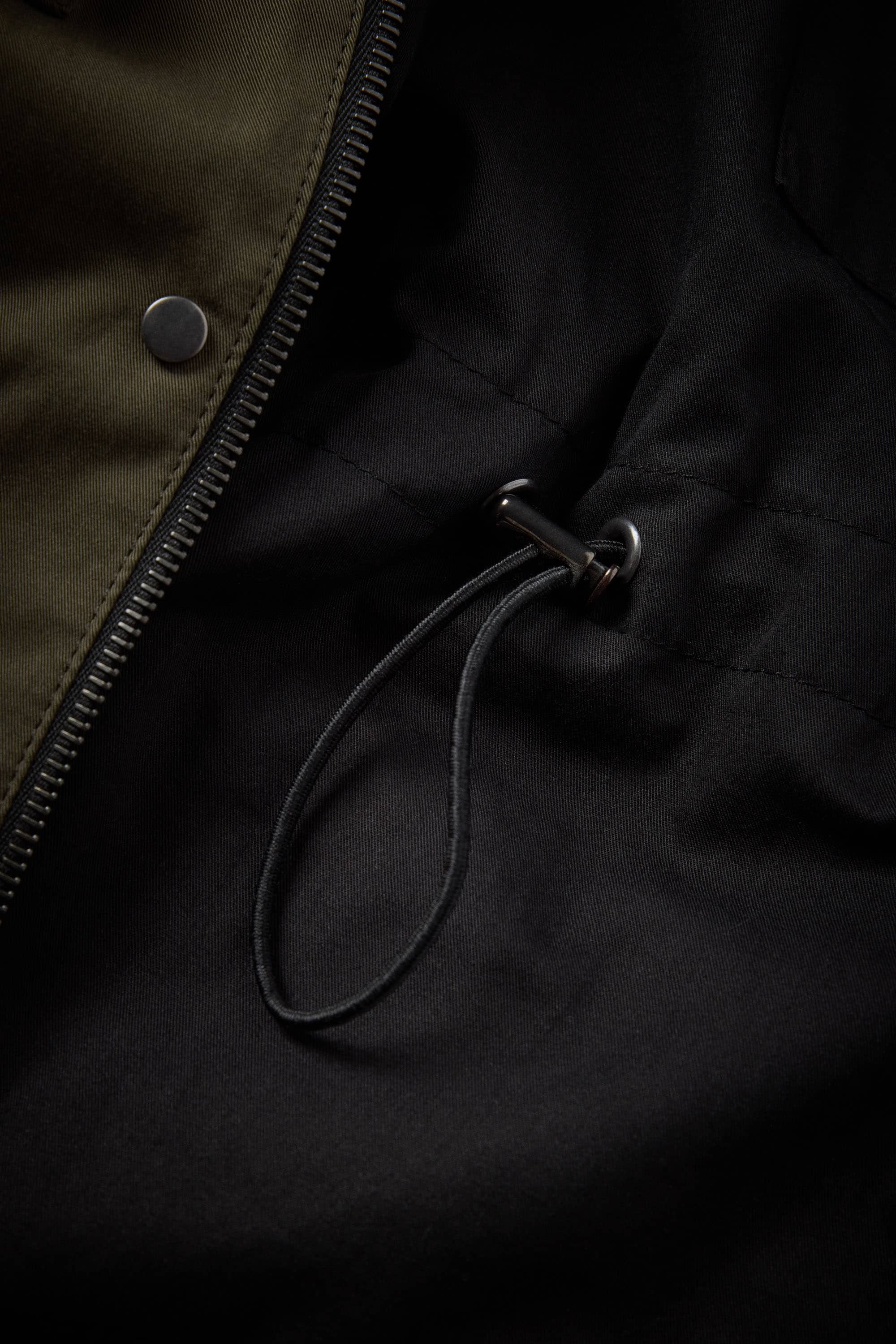 Fully lined interior with inside patch pocket & drawstring channel waist