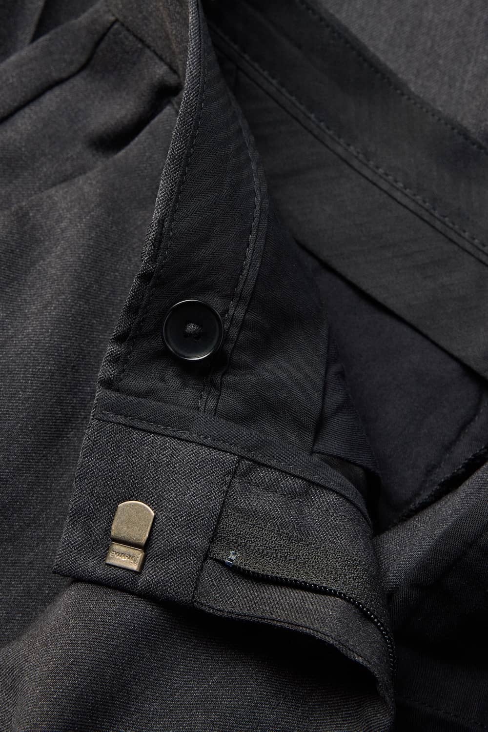 Tailored waistband with hidden hook and button