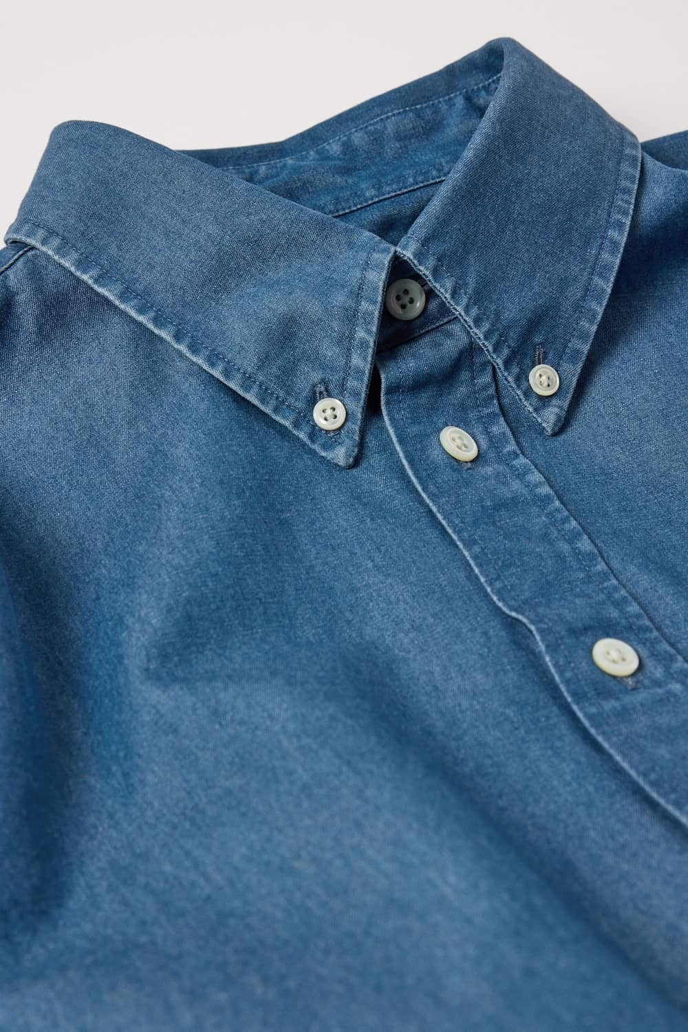 Button down collar and gently rounded cuffs